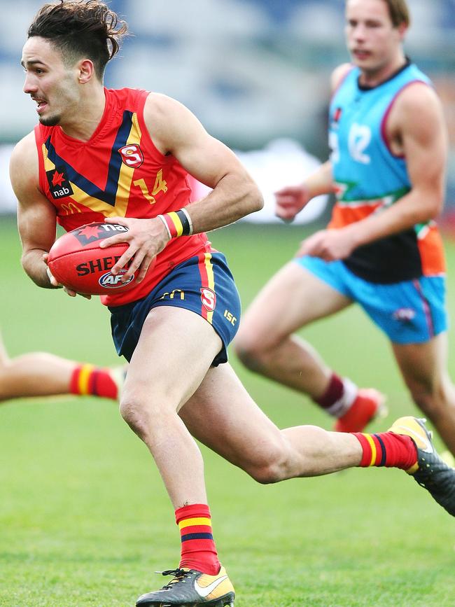 South Australian Izak Rankine runs with the ball during the under-18 championships. Picture: Michael Dodge/Getty