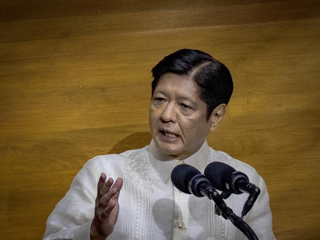 MANILA, PHILIPPINES - JULY 22: Philippine President Ferdinand Marcos Jr. delivers his third State of the Nation Address before lawmakers at the House of Representatives on July 22, 2024 in Quezon city, Metro Manila, Philippines. President Marcos is facing significant challenges, including a notable decline in his approval ratings for his administration's failure to tame inflation and other economic issues. Moreover, his ties with the Duterte family, particularly Vice President Sara Duterte, has become strained, complicating the political landscape as both families vie for influence ahead of the 2025 midterm elections, where legislative support will be crucial for Marcos to maintain his agenda. (Photo by Ezra Acayan/Getty Images)