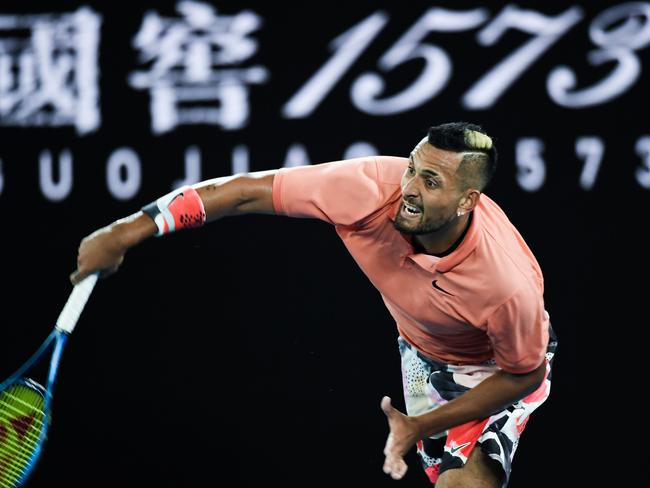 Australia's Nick Kyrgios serves against Spain's Rafael Nadal during their men's singles match on day eight of the Australian Open tennis tournament in Melbourne on January 27, 2020. (Photo by Saeed KHAN / AFP) / IMAGE RESTRICTED TO EDITORIAL USE - STRICTLY NO COMMERCIAL USE