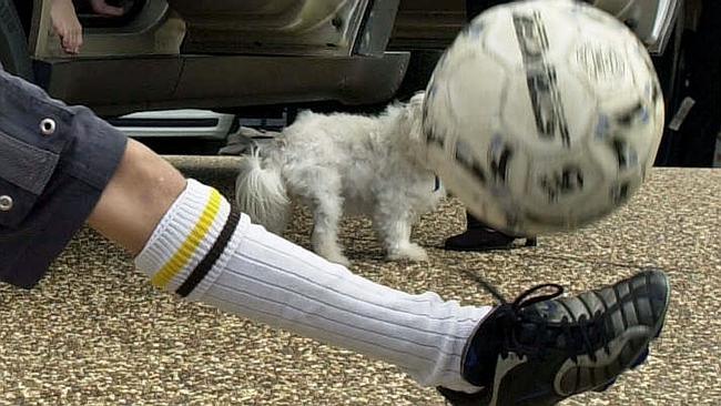 APRIL 11, 2003: Generic photo of Blake Spriggs (11) getting some last minute practice in with his soccer ball before mum Lea...