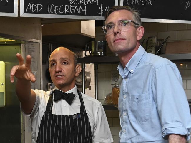 MOSS VALE, AUSTRALIA - FEBRUARY 22: Premier of New South Wales Dominic Perrottet and  Member for Goulburn Wendy Tuckerman meets with Loannis Bernardo owner of Bernie's Diner in Moss Vale. Picture: NCA NewsWire / Martin Ollman