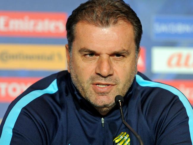 Socceroos coach Ange Postecoglou and Mile Jedinak attend a pre-match press conference in Melbourne, Monday, Oct. 10, 2016. The Socceroos will play Japan in a World Cup qualifier at Etihad stadium tomorrow. (AAP Image/Joe Castro) NO ARCHIVING