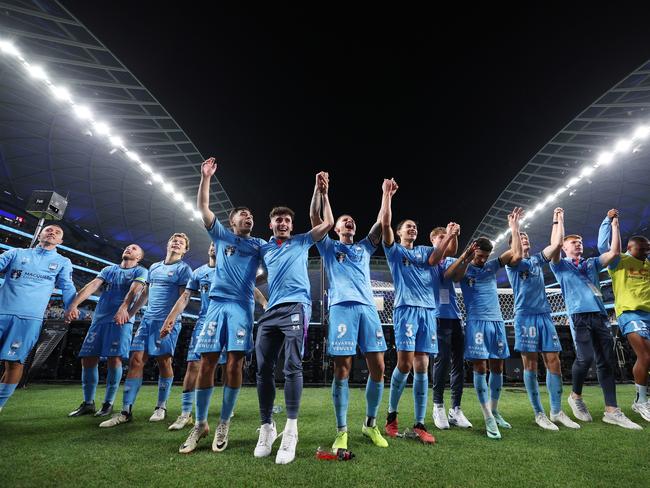 Sydney FC players celebrate victory against the Wanderers. Picture: Mark Metcalfe/Getty Images