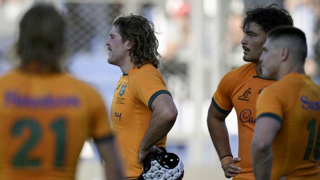 Australia's Wallabies flanker Fraser McReight (C) reacts next to teammates wing Jordan Petaia (2-R), flyhalf James O'Connor (R) and scrumhalf Tate McDermott.