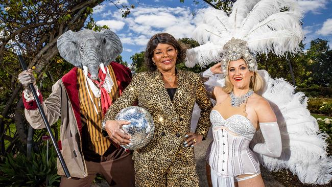 Chris Mitchell from The Marvellous Elephant Man, Velvet Rewired star Marcia Hines and burlesque artist Lyra la Belle celebrate the release of the 2023 Adelaide Fringe program at the Adelaide Botanic Gardens. Picture: Tom Huntley