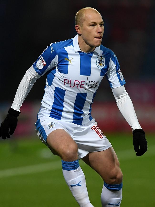 Aaron Mooy pockets $3.8 million-a-year is for Huddersfield in England’s second tier. Picture: Getty Images