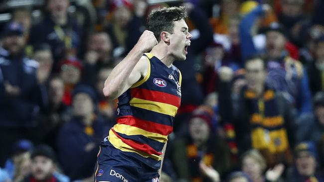 Mitch McGovern celebrates a goal for Adelaide. Picture: Sarah Reed.
