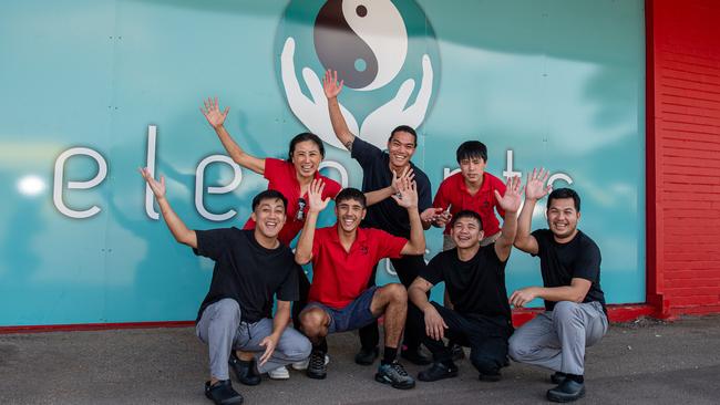 Business woman Jenny Um and some of her hospitality team outside her new business venture, Elements and Daily Eatz. Picture: Pema Tamang Pakhrin