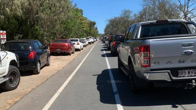 Cars backed up on Seaworld Drive north of the bushfire. Picture: Joey McGahey