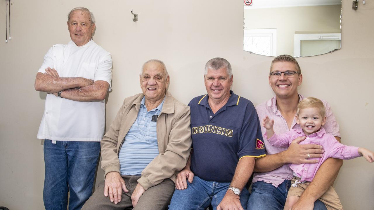 Five generations (from left) Glen, Brad, and Mitchell McKeiver watch barber Greg Gabbett cut 20 month old Connor McKeiver’s hair for the first time. 5 generations of the McKeiver family have had their hair cut by Greg Gabbett. Picture: Nev Madsen.