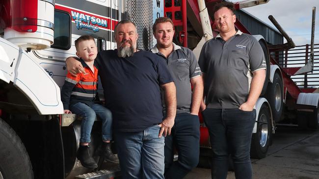 Adam Watson with grandson Campbell 4 and sons Jacab (Jacab) and Bradan (Bradan). Watson Haulage based in the Huon Valley truck company and family with a history of forest workers have been stiffed by the government awarding a contract to a Victorian firm. Picture: Nikki Davis-Jones