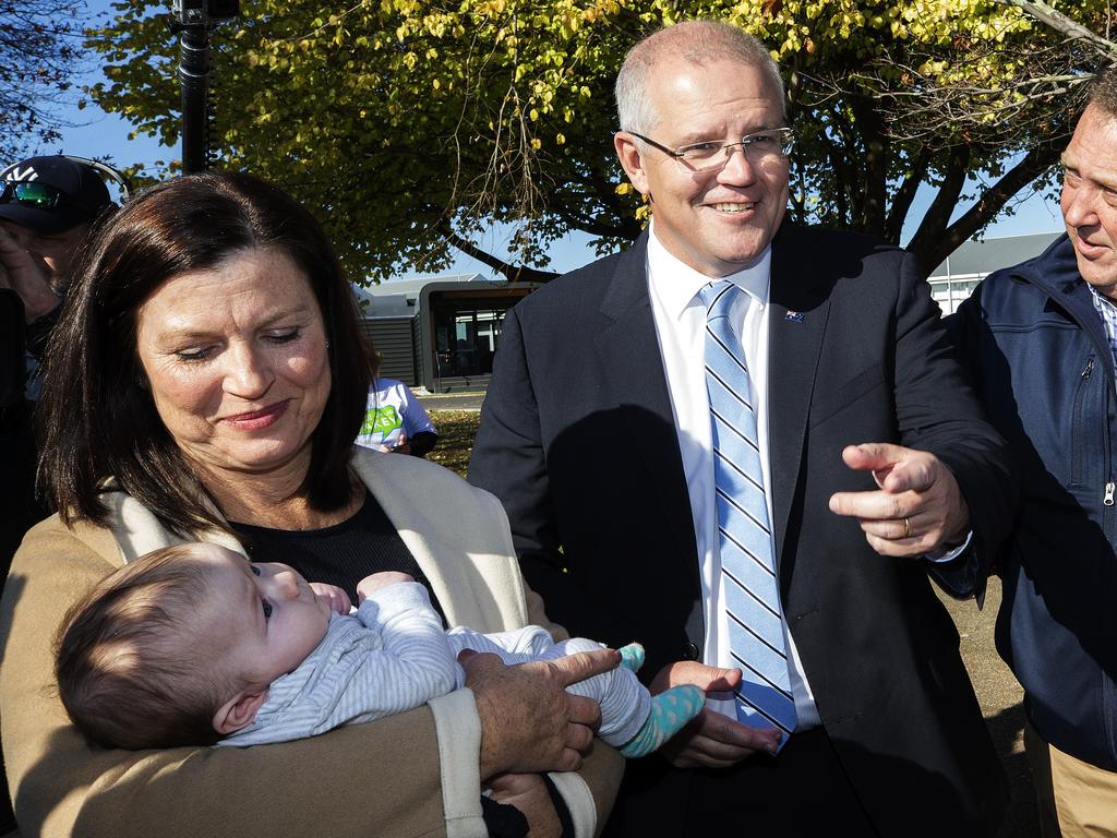 Jenny Morrison holding Elvie Cooper (8 weeks old), Prime Minister Scott Morrison and Braddon Liberal candidate Gavin Pearce at Ulverstone. PICTURE CHRIS KIDD