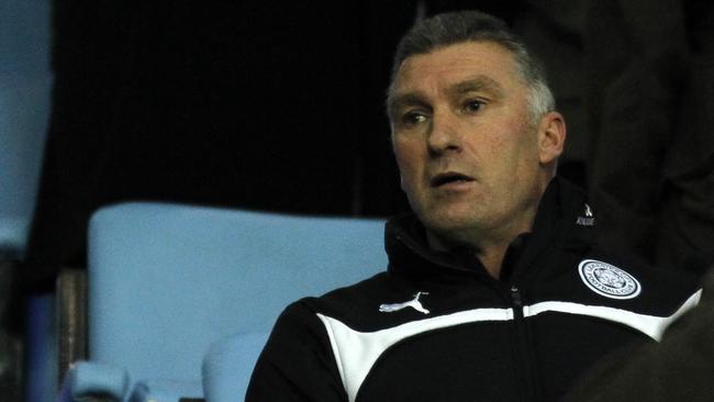 Leicester City's English manager Nigel Pearson looks on from his position in the stands ahead of the English Premier League football match between Aston Villa and Leicester City at Villa Park in Birmingham, central England on December 7, 2014. AFP PHOTO/IAN KINGTON RESTRICTED TO EDITORIAL USE. No use with unauthorized audio, video, data, fixture lists, club/league logos or "live" services. Online in-match use limited to 45 images, no video emulation. No use in betting, games or single club/league/player publications.