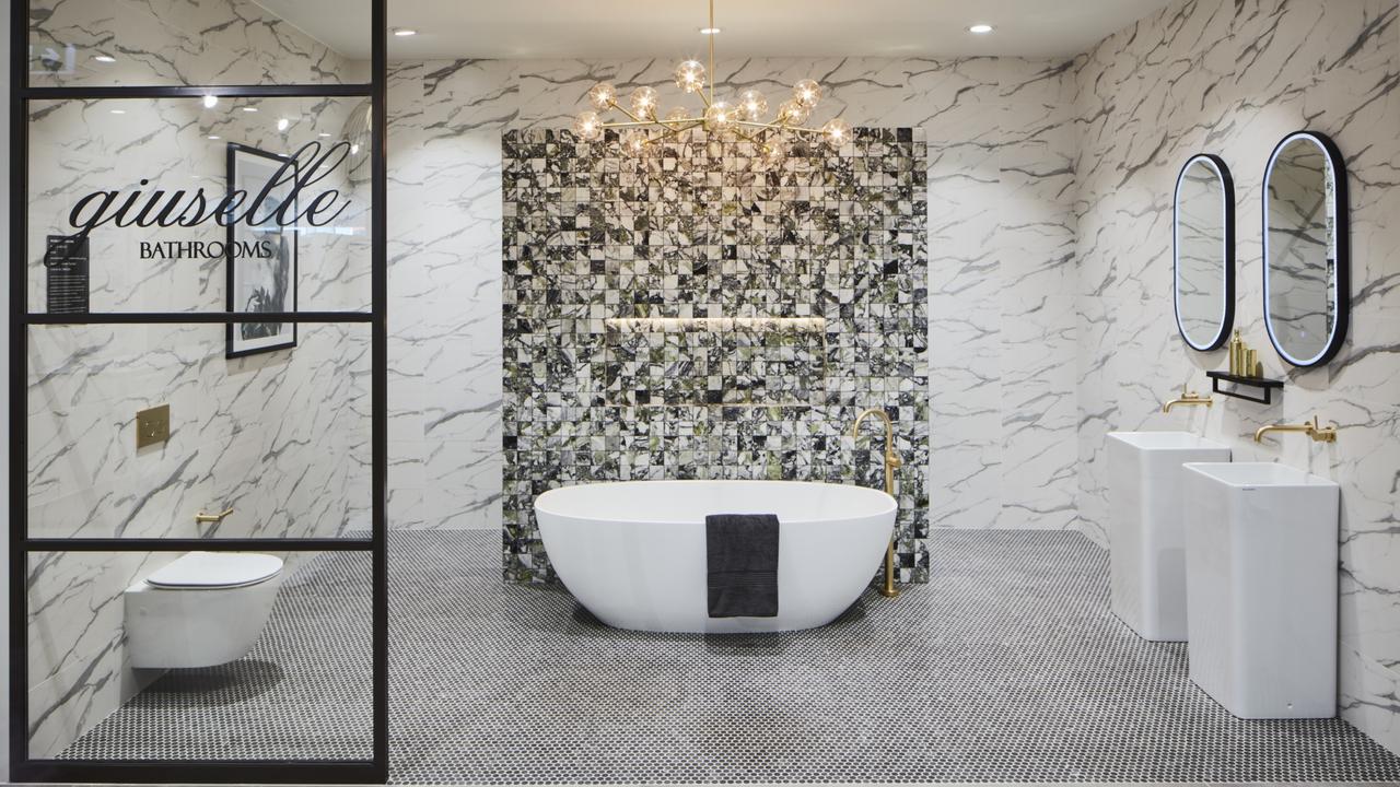 LED mirrors, freestanding bath tubs and brass accessories are all the rage.