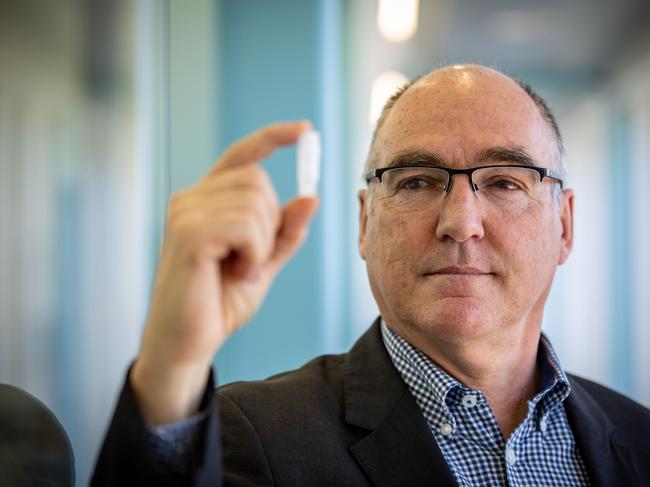 MELBOURNE, AUSTRALIA - NOVEMBER 08: CSLÃ¢â¬â¢s Chief Scientific Officer, Dr Andrew Nash shows a small vial which indicates the size of the iml of cells that will go into the bioreactor to create 30 ml doses of the AstraZeneca vaccine. November 08, 2020 in Melbourne, Australia. CSL will begin manufacturing AstraZeneca-Oxford University COVID-19 vaccine from Monday. (Photo by Darrian Traynor/Getty Images)