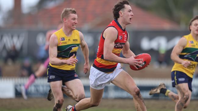 Crow Tyler Brown bursts clear against the Eagles at Woodville Oval on Sunday. Picture: Cory Sutton/SANFL