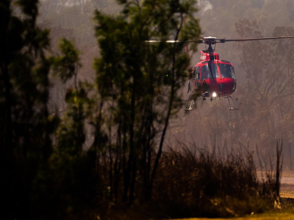 Another day of extreme fire conditions saw numerous fires break out across Darwin’s rural regions in late August.. A bushfire at Gunn Point Road was quickly brought under control by numerous crews working in windy conditions. Picture: Che Chorley