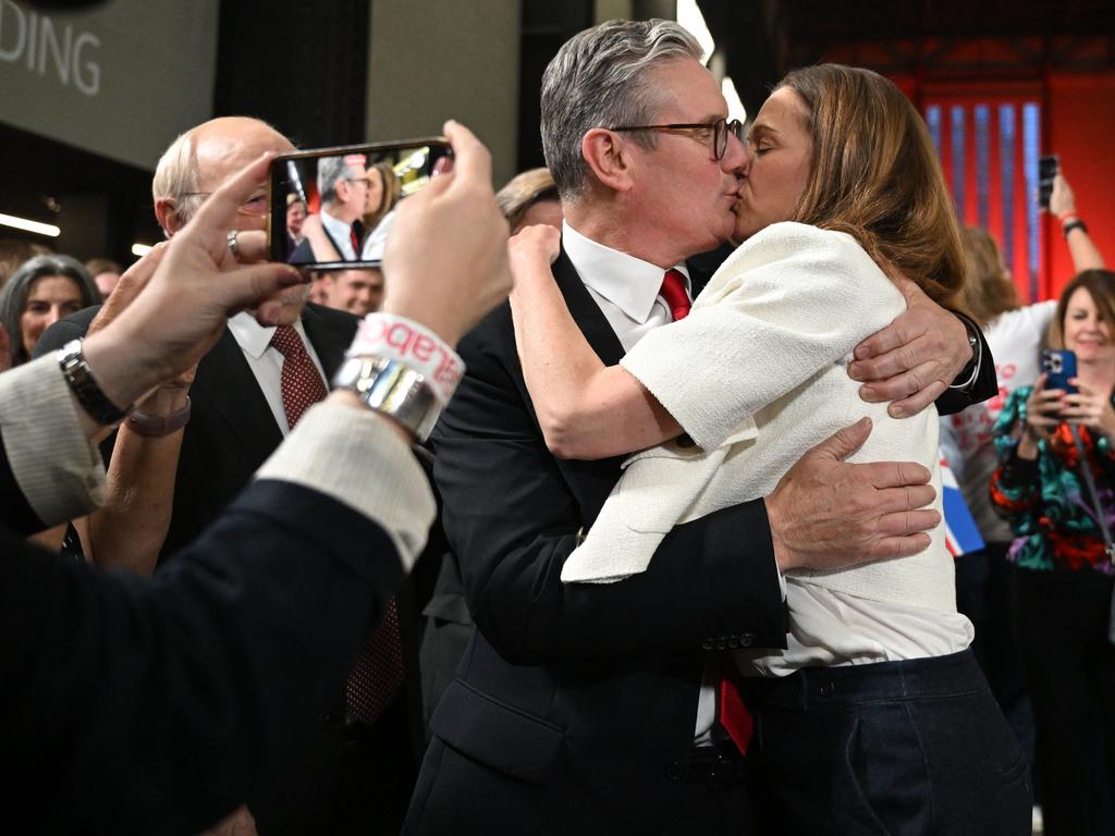 Britain’s Labour Party leader Keir Starmer kisses his wife Victoria during a victory rally at the Tate Modern in London early on July 5, 2024. Picture: AFP