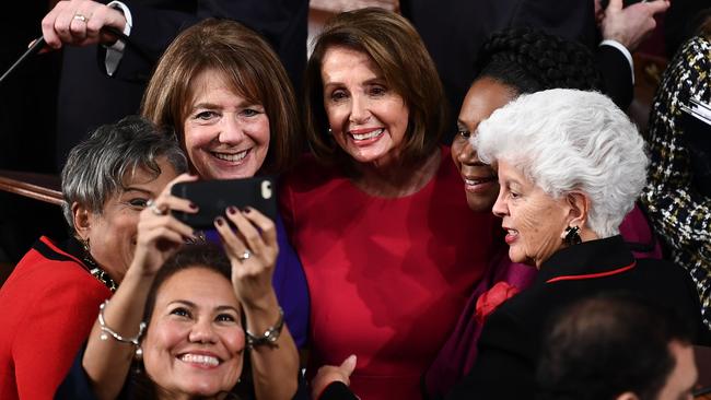 Incoming House Speaker Nancy Pelosi is photographed with fellow Congresswomen during the opening session of the 116th Congress at the US Capitol.