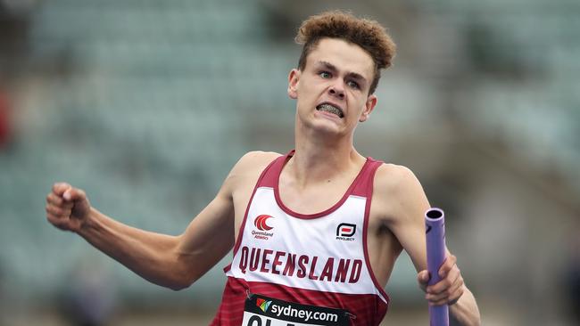 Kaleb Clark of Queensland celebrates winning the relay.(Photo by Mark Kolbe/Getty Images)