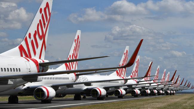 Grounded Virgin Australia aircraft parked at Brisbane airport on Tuesday Picture: AAP