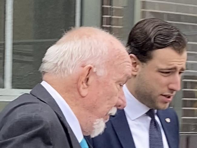 Phillip Navarra (right) and his lawyer (left) outside Liverpool Local Court on Wednesday.