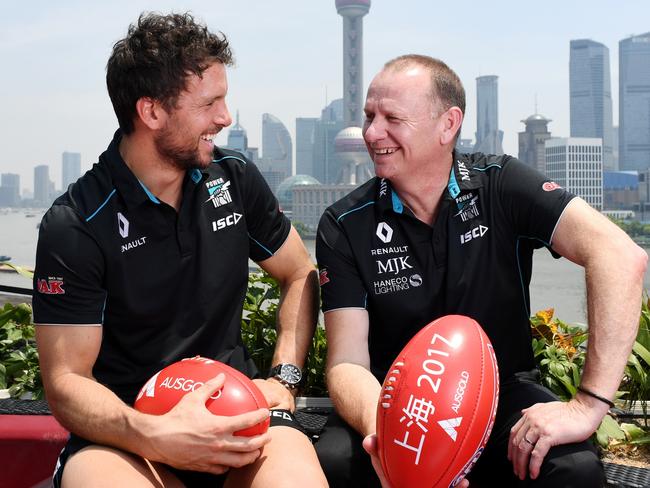 EXCLUSIVE IMAGE - NO AUS/ NO PERTH NOW . FEE APPLIES .  Captain Travis Boak of the Power (left) and Coach Ken Hinkley of the Power in front of the Shanghai skyline from Bar Rouge in Shanghai, China, Thursday, May 11, 2017. (AAP Image/Tracey Nearmy) NO ARCHIVING