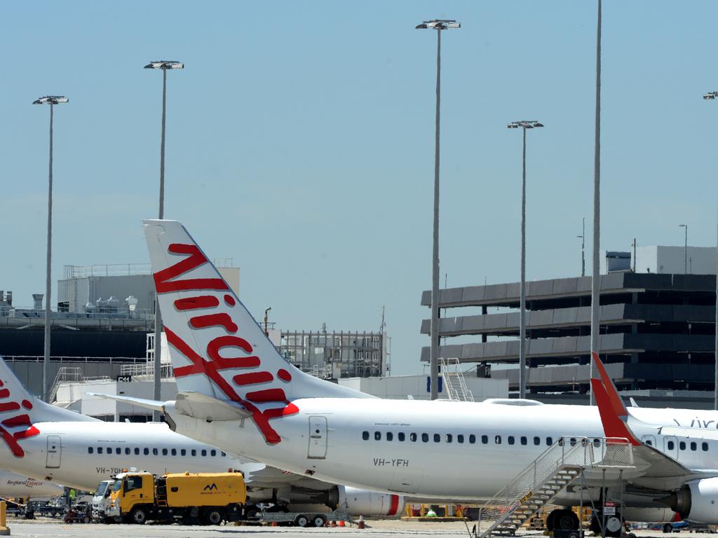 Virgin planes parked at Melbourne Airport. Picture: NCA NewsWire / Andrew Henshaw