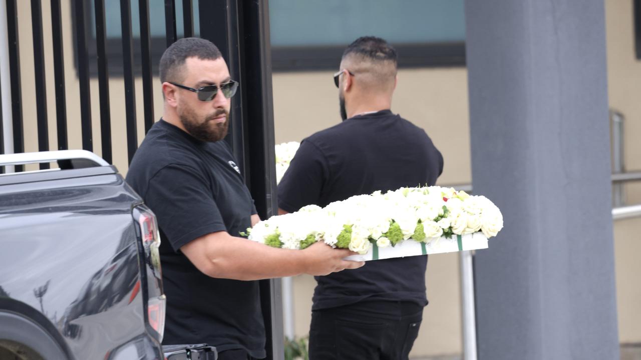 Mourners carried flowers which spelt Abdulrahim’s nickname, Suna. Picture: NewsWire / David Geraghty