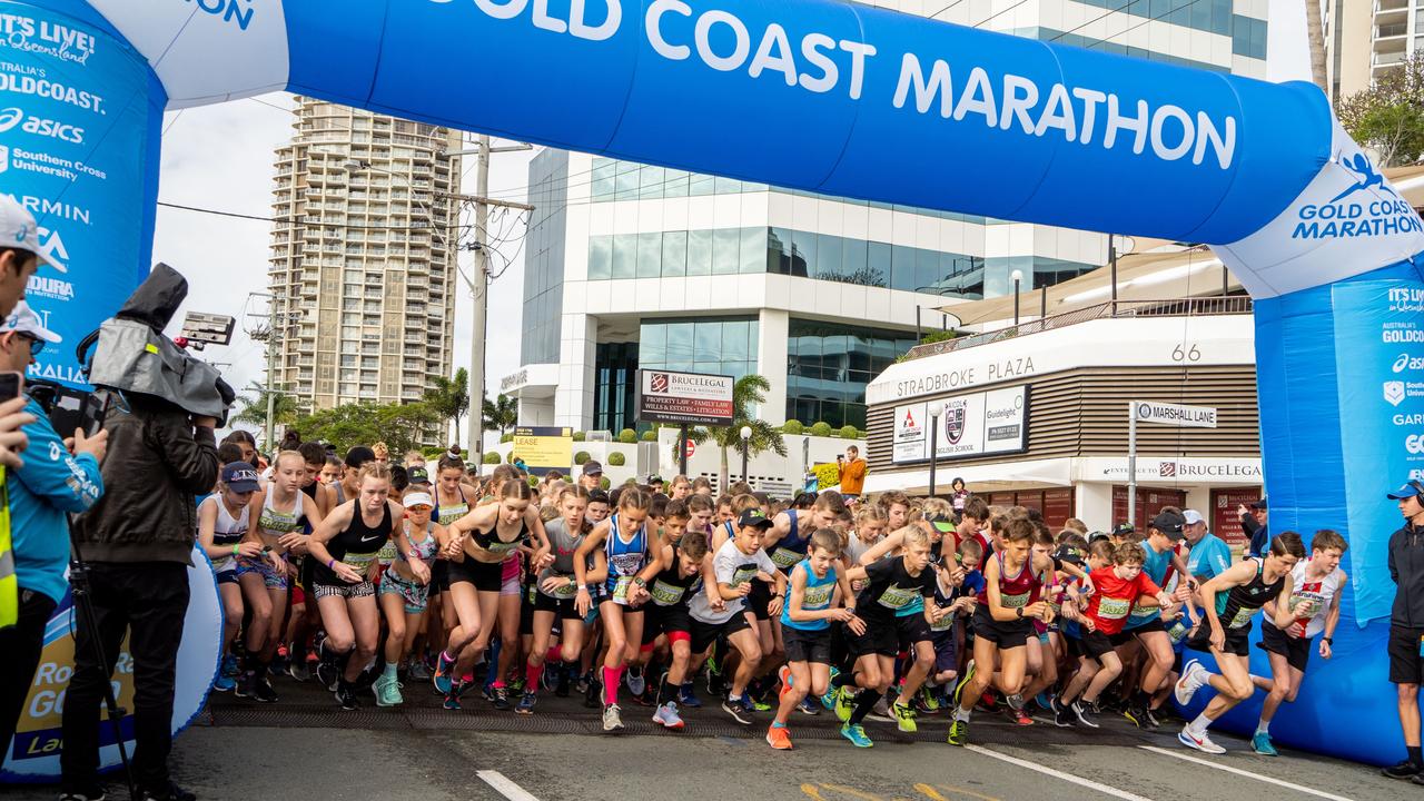 Competitors take off at the start of the Garmin 4km Junior Dash.