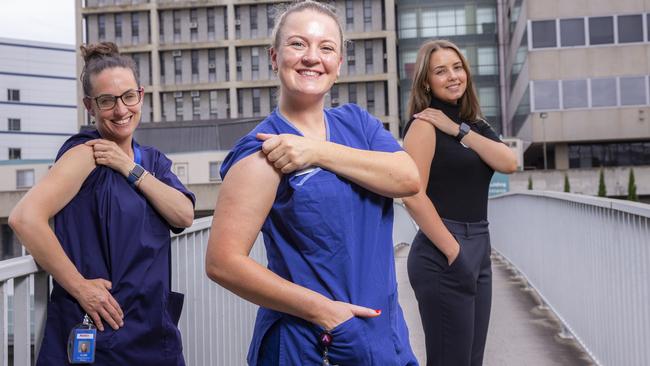 Nurses at Austin Health roll up their sleeves to support COVID-19 vaccines. Picture: Wayne Taylor