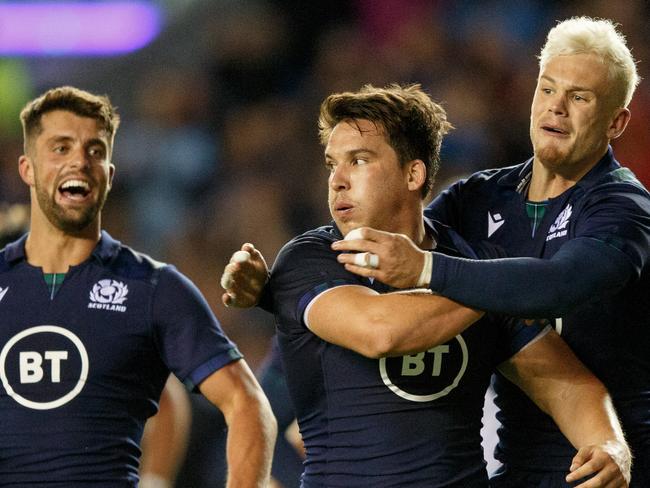 EDINBURGH, SCOTLAND - SEPTEMBER 06: Sam Johnson of Scotland (centre) scores try during the international match between Scotland and Georgia at Murrayfield on September 6, 2019 in Edinburgh, United Kingdom. (Photo by Robert Perry/Getty Images)