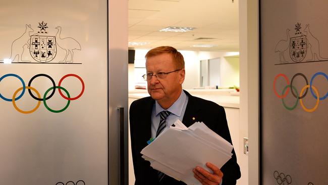 (FILES) This file photo taken on August 23, 2013 shows Australian Olympic Committee chief John Coates arriving for a press conference in Sydney. Powerful Australian Olympic Committee chief John Coates is facing a crisis April 2017 as he seeks re-election, with the organisation rocked by claims of bullying in a bitter push to oust him after 27 years. / AFP PHOTO / SAEED KHAN