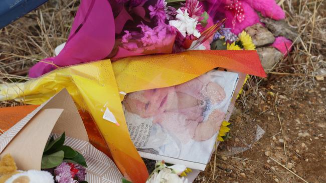 A tribute for baby Kobi by a road side sign at the Whispering Wall. Picture: NCA NewsWire / David Mariuz