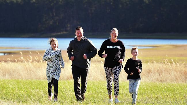 FAMILY FUN: Jeff and Tanya George with twins Chloe and Liam at Myponga reservoir on Tuesday. Picture: Mark Brake