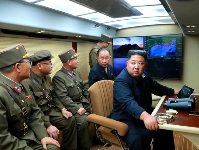 Kim Jong-un supervising the launch of a ballistic missile. Picture: AFP