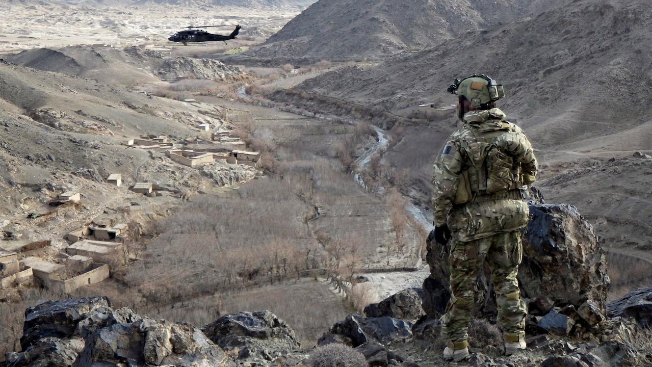 An Australian Army soldier from Special Operations Task Group maintains a watchful eye over Chenartu village in Uruzgan province, Afghanistan. Picture: Supplied