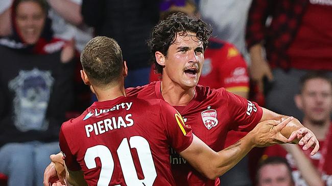 ADELAIDE, AUSTRALIA - JANUARY 22: Archie Goodwin of Adelaide United celebrates his goal with Dylan Pierias of Adelaide United during the round 14 A-League Men match between Adelaide United and Auckland FC at Coopers Stadium, on January 22, 2025, in Adelaide, Australia. (Photo by Sarah Reed/Getty Images)