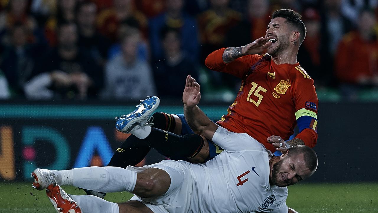 Eric Dier was booked for a sliding challenge on Sergio Ramos.