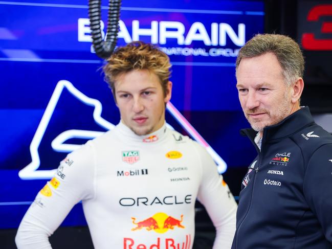 Axed Red Bull star Liam Lawson (left) with team boss Christian Horner. Picture: Getty