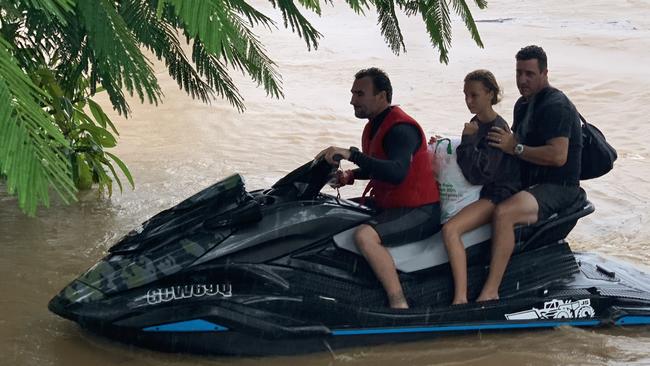 Surfing legend Joel Parkinson out rescuing flood victims in northern NSW.