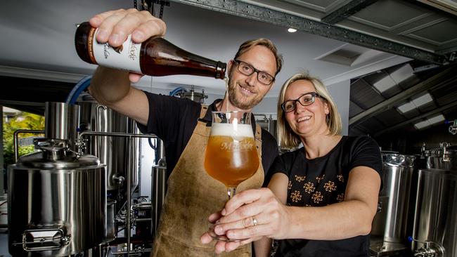 Jimmy Van Eetvelde and Annelies Nijskens of Madocke Brewery, a nano Belgian-style brewery set up by the pair in their Pacific Pines garage. Picture: Jerad Williams