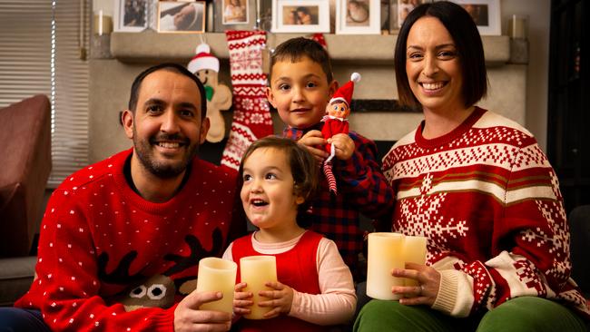 Matthew, Pia, 2, Leo, 6, and Adriana Annetta are pleased for Christmas Carols to return to Elder Park this year. Picture: The Advertiser/ Morgan Sette