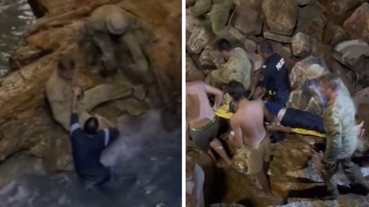 Australian soldiers have rescued a swimmer from dark waters below a Darwin jetty. Picture: TikTok / @atheel