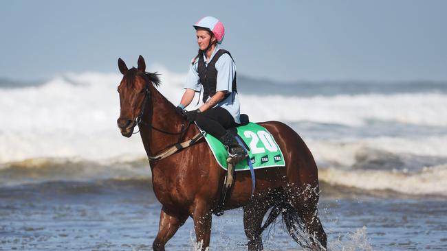 Bella Nipotina and trackwork rider Shannon Durant at the beach at Anna Bay. Picture: Rohan Kelly