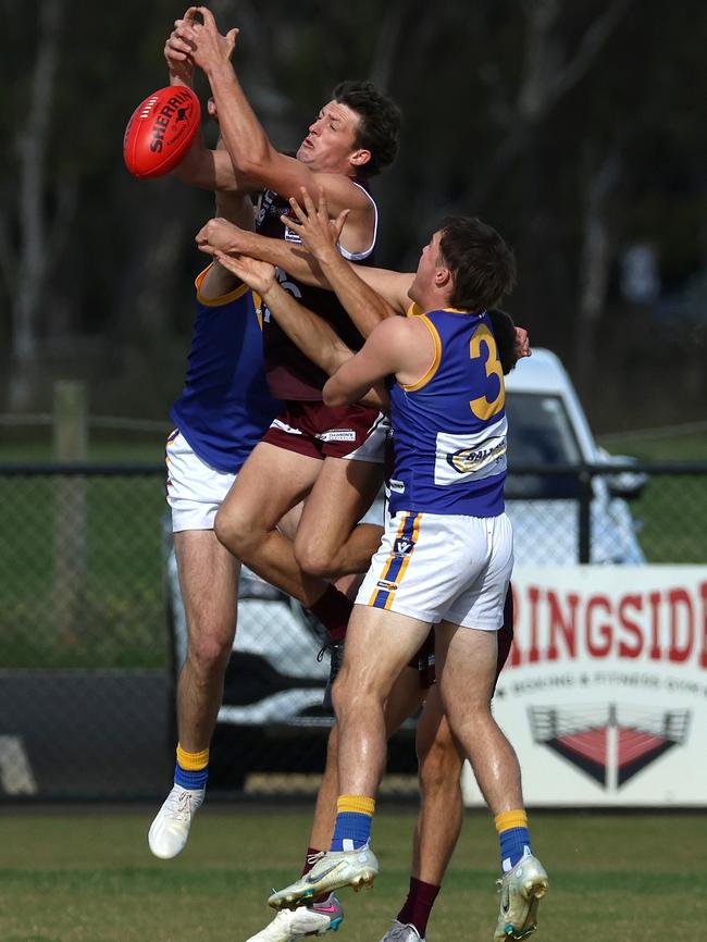 Ballarat: Melton’s Harrison Hanley flies for the ball. Picture: Hamish Blair