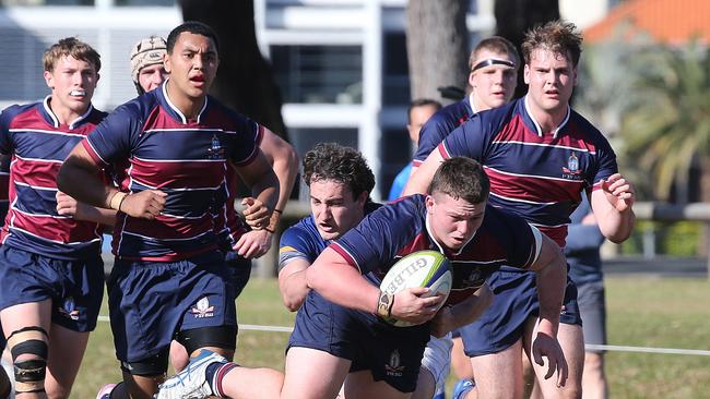 GPS schoolboy rugby union game between The Southport School and Churchie. TSS Player No8 Nick Hilton Churchie Player No 11 Connor Simpson Picture Mike Batterham