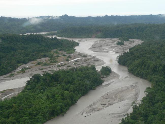 Mine tailings dumped at the rate of 110 tonnes a minute into the Ok Tedi River from the Ok Tedi gold and copper mine, have killed 1600 square kilometres of rainforest. Pic Greg Roberts.