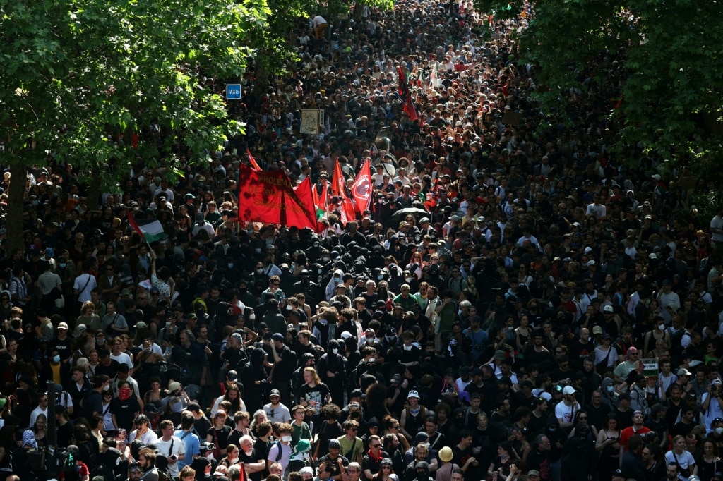 300,000 rally across France for May 1, union says