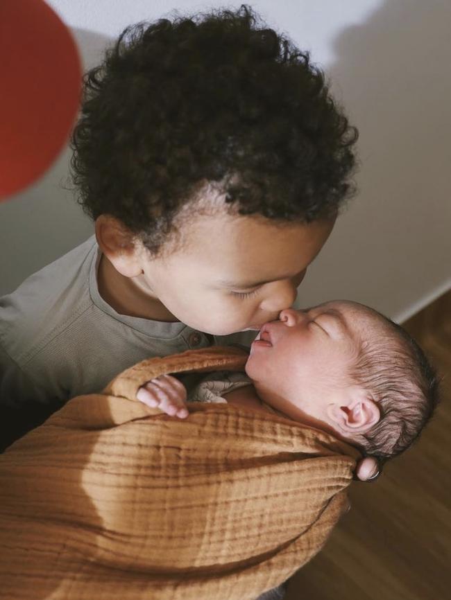 Aliir Aliir’s two-year-old son Mayom with their new baby boy. Picture: Instagram